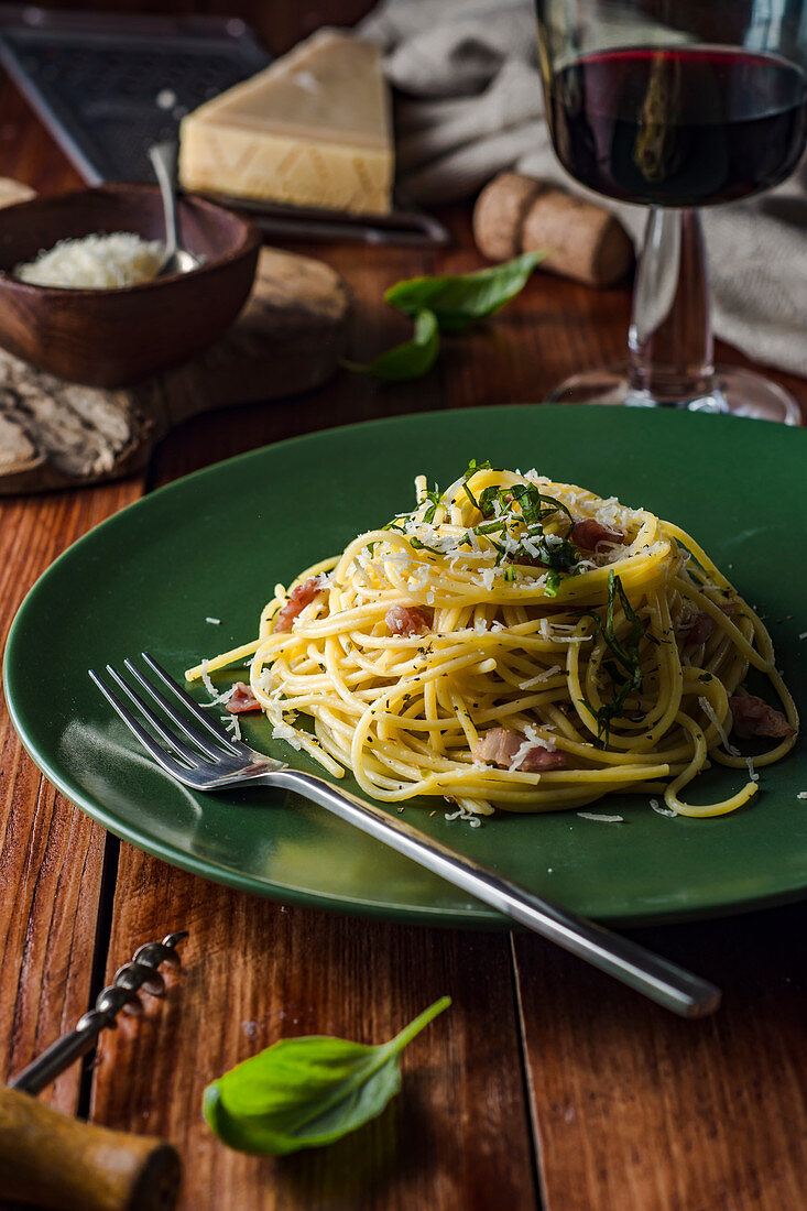 Spaghetti with herb butter, bacon and parmesan