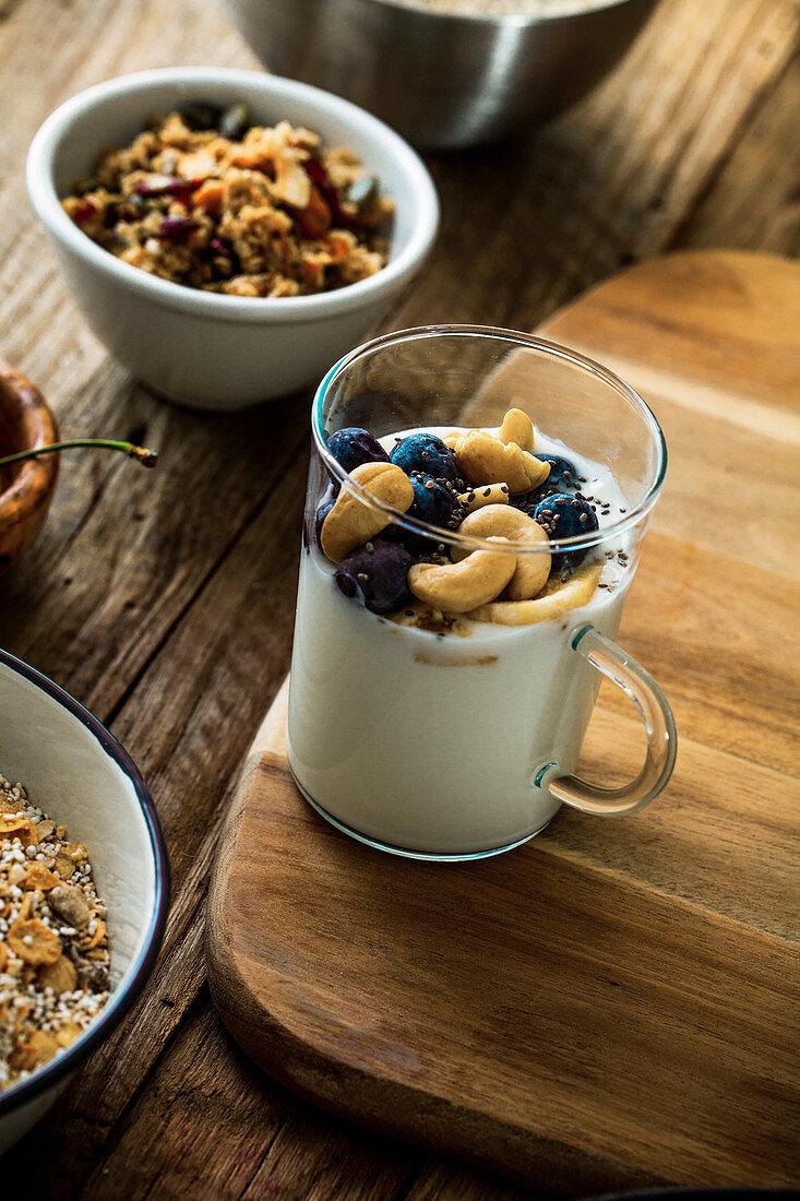 Healthy breakfast - screals with fruit and yogurt with seeds