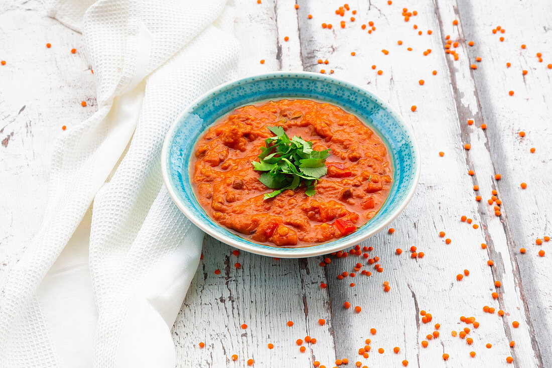 Indian dhal with red lentils garnished with coriander