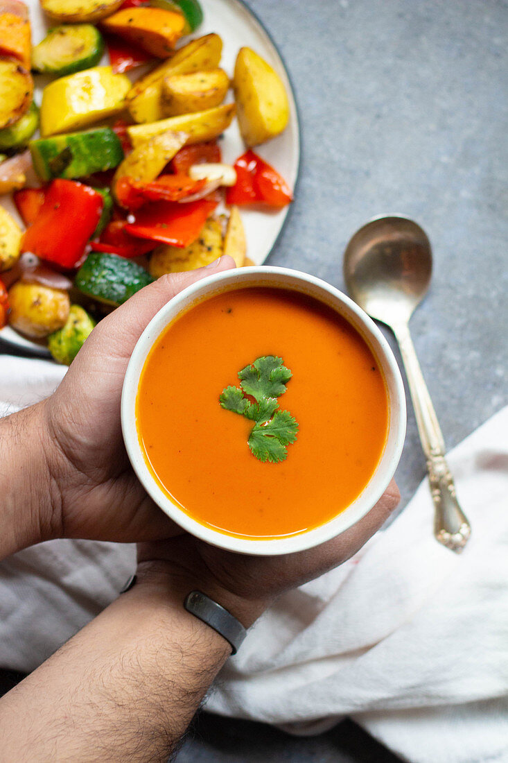 Cream of tomato soup with a mixed vegetables platter