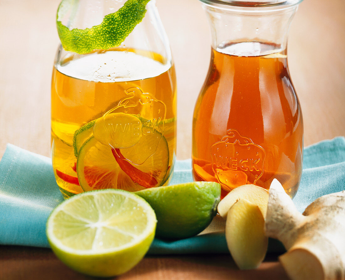 Ginger vinegar and ginger-lime oil in two bottles