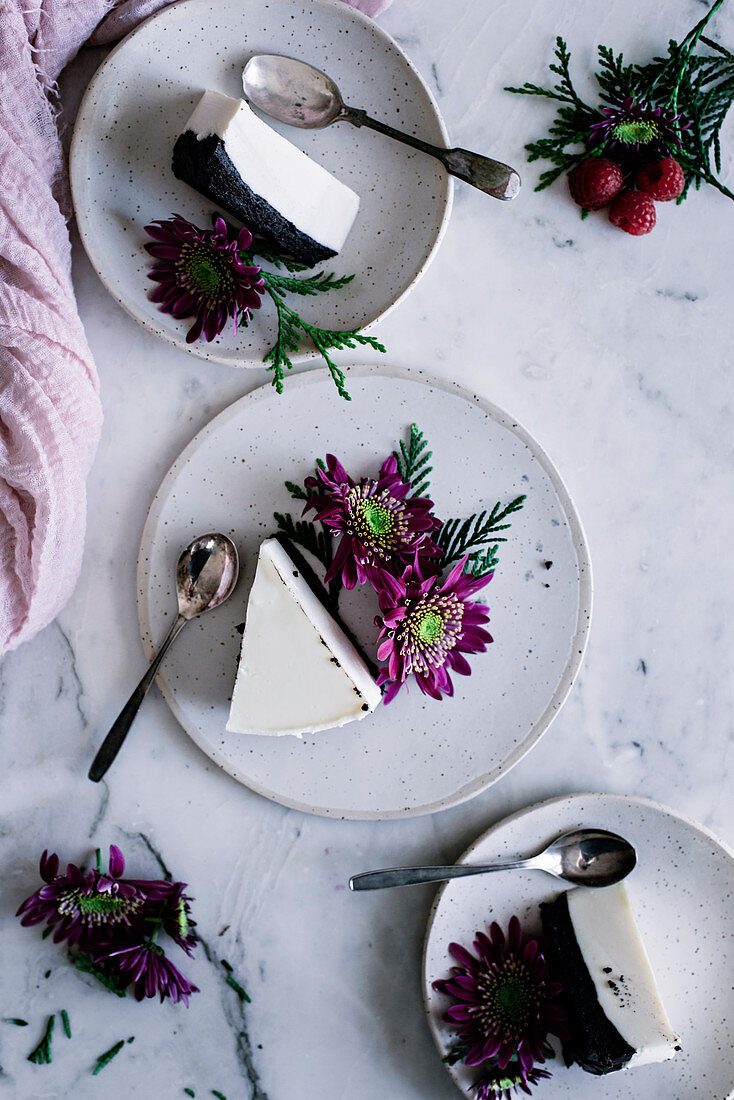 Plates with cake and flowers