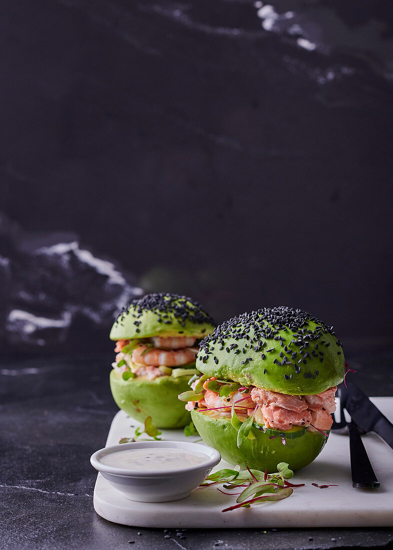 Avocado, prawn and smoked trout burgers with yoghurt mayo dressing