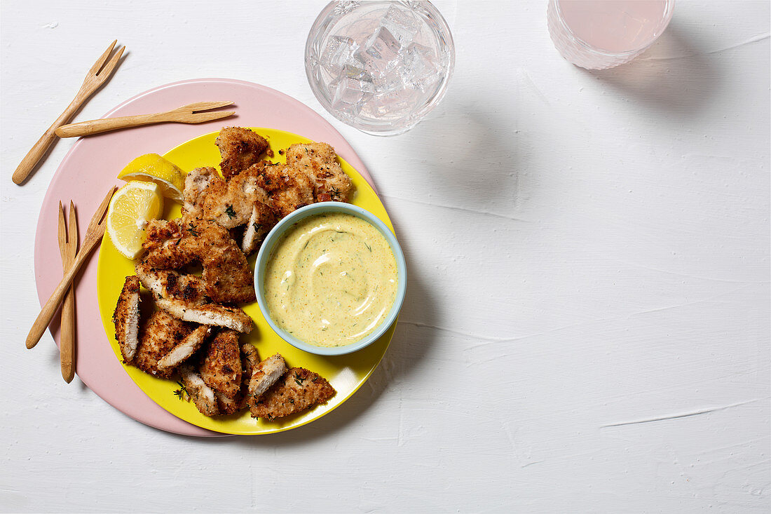 Coconut and cashew chicken strips with curry mayo