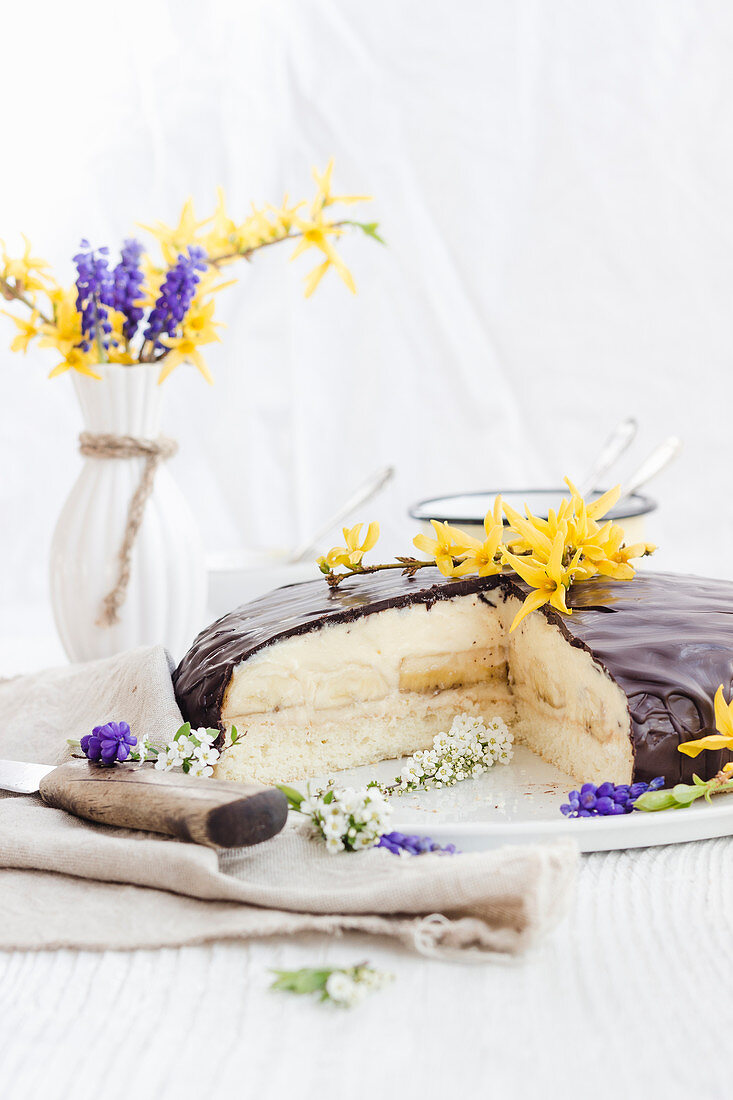 Banana cream cake with chocolate icing