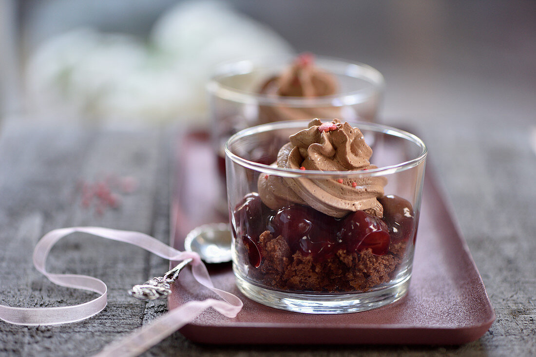 Vegan chocolate, tonka and cherry desserts in glasses