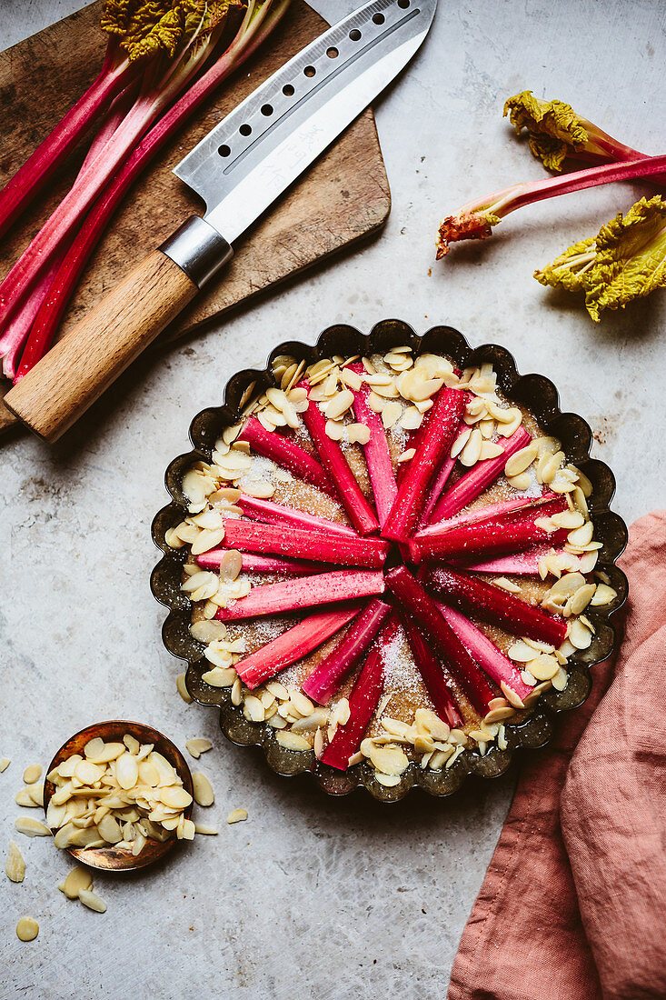 Rhubarb cake with almond flakes