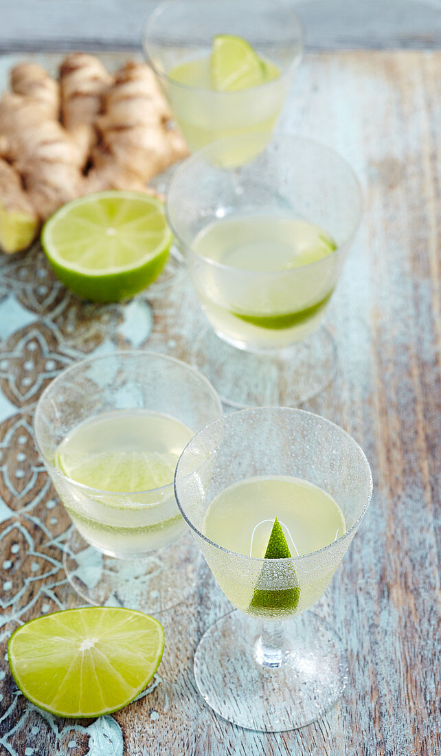 Glasses of homemade lime and ginger liqueur