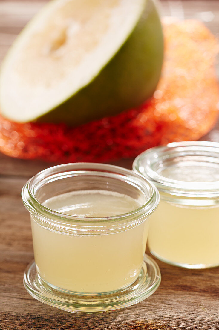 Homemade pomelo syrup in a mason jar