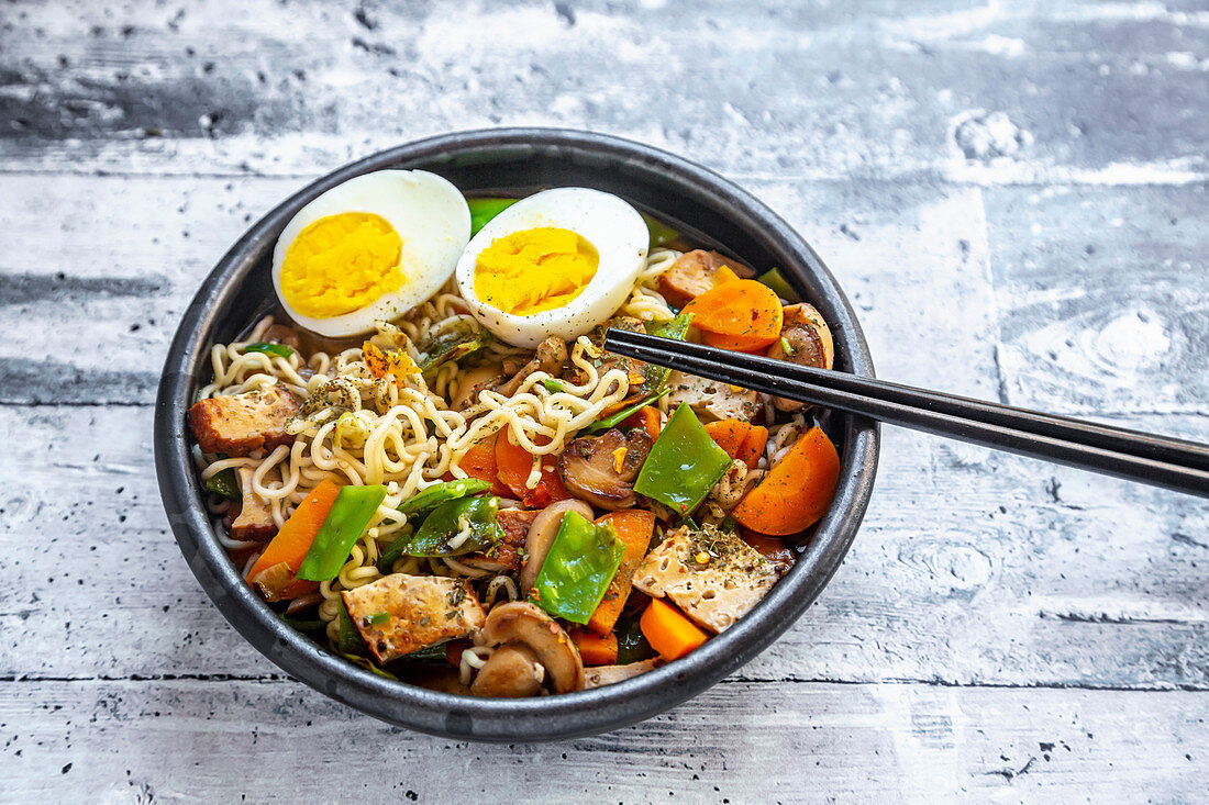Ramen soup with vegetables, mushrooms, smoked tofu and egg