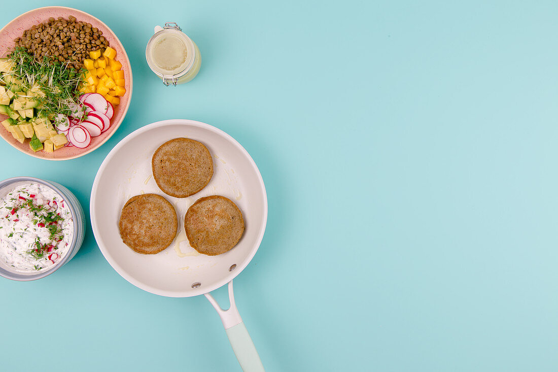 Two different type of lentils – as pancakes and as a salad with fruit