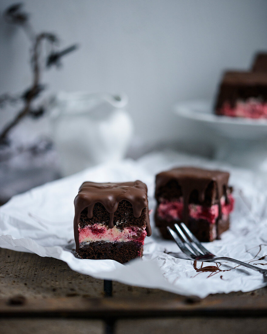 Vegan chocolate cake with buttercream and raspberries