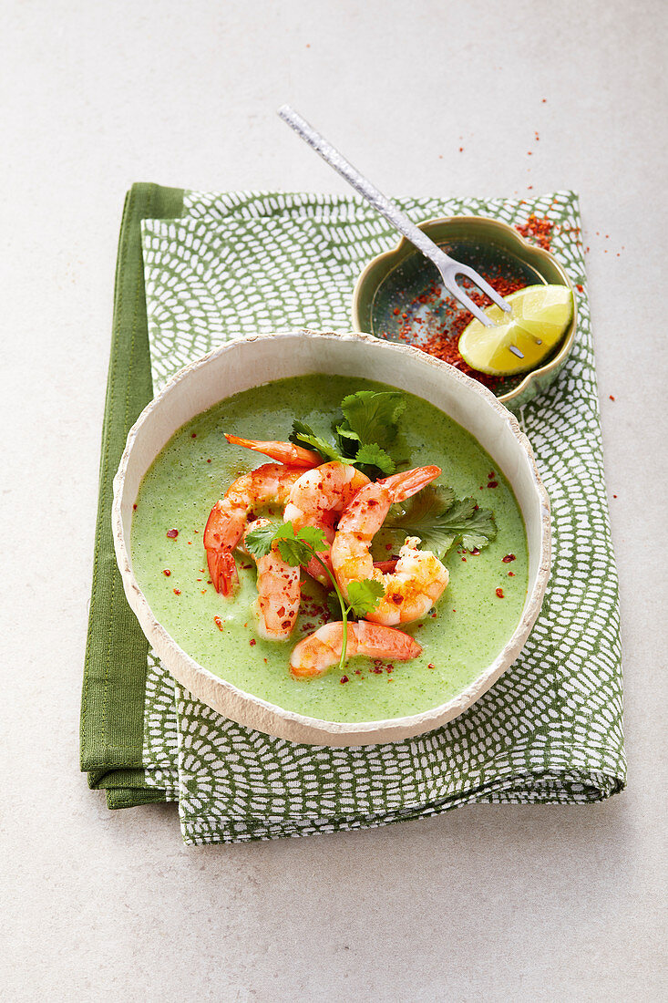 Broccoli and coconut soup with shrimps