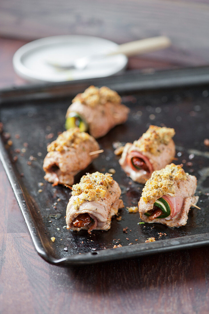 Stuffed pork tenderloin rolls with a crunchy crust