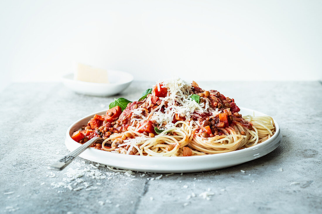 Spaghetti with vegetarian Bolognese and Parmesan cheese