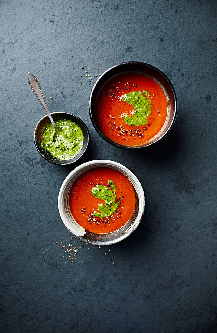 Roasted red pepper and tomato soup with spinach and wild garlic pesto
