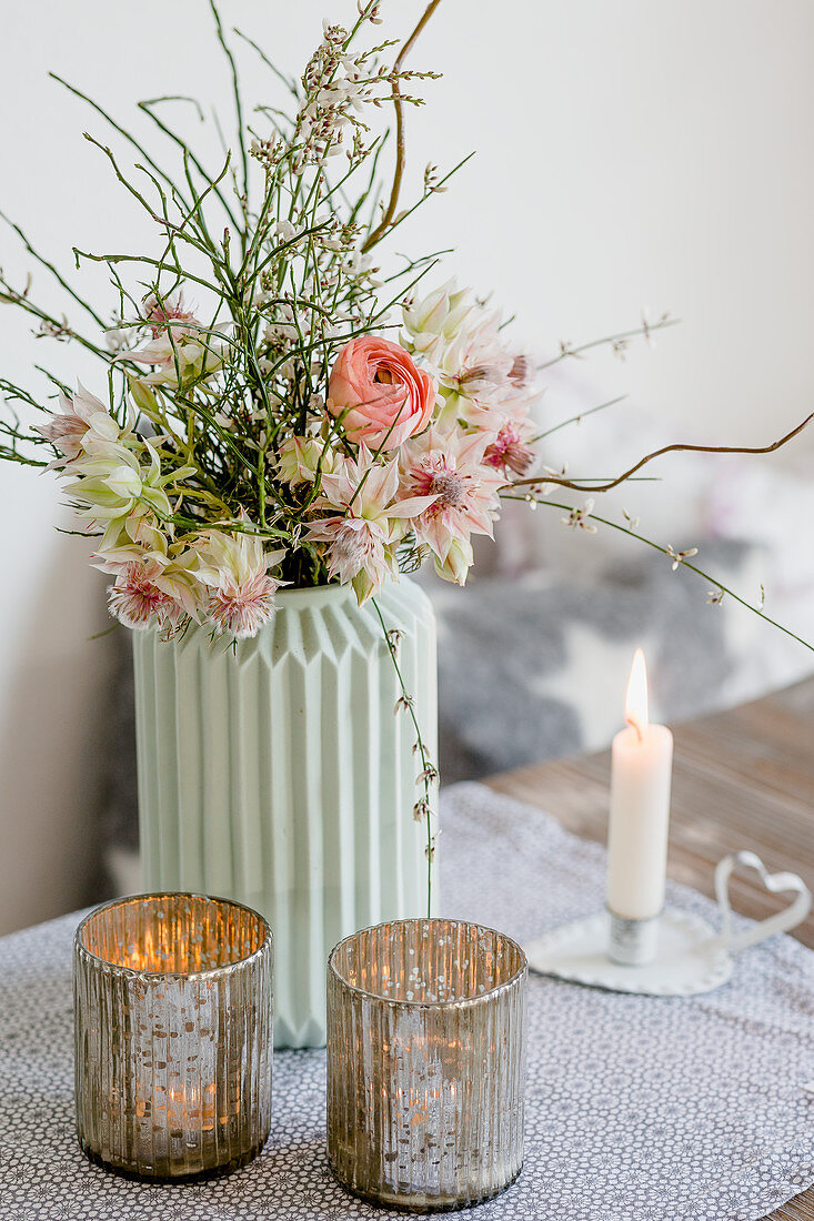 Spring bouquet of blushing bride, ranunculus, gorse and bilberry branches