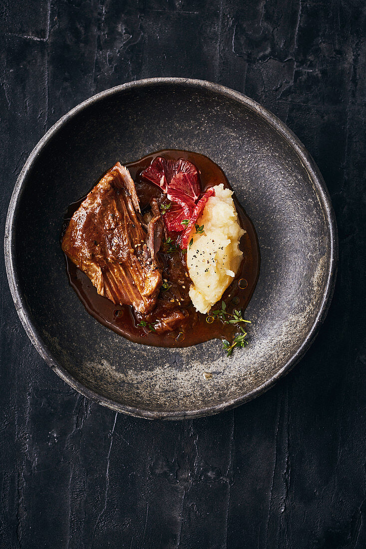 Braised beef with mashed black salsify and blood oranges