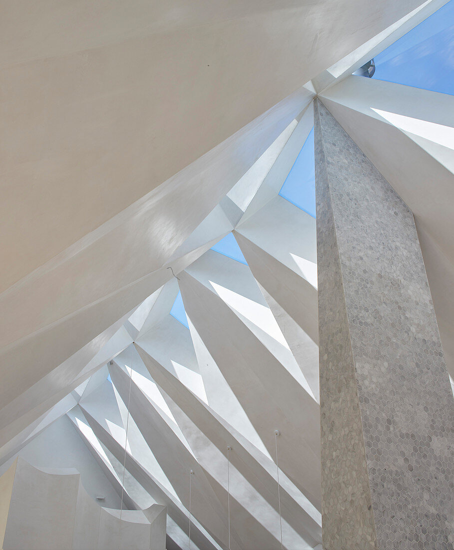 Faceted ceiling with triangular skylights