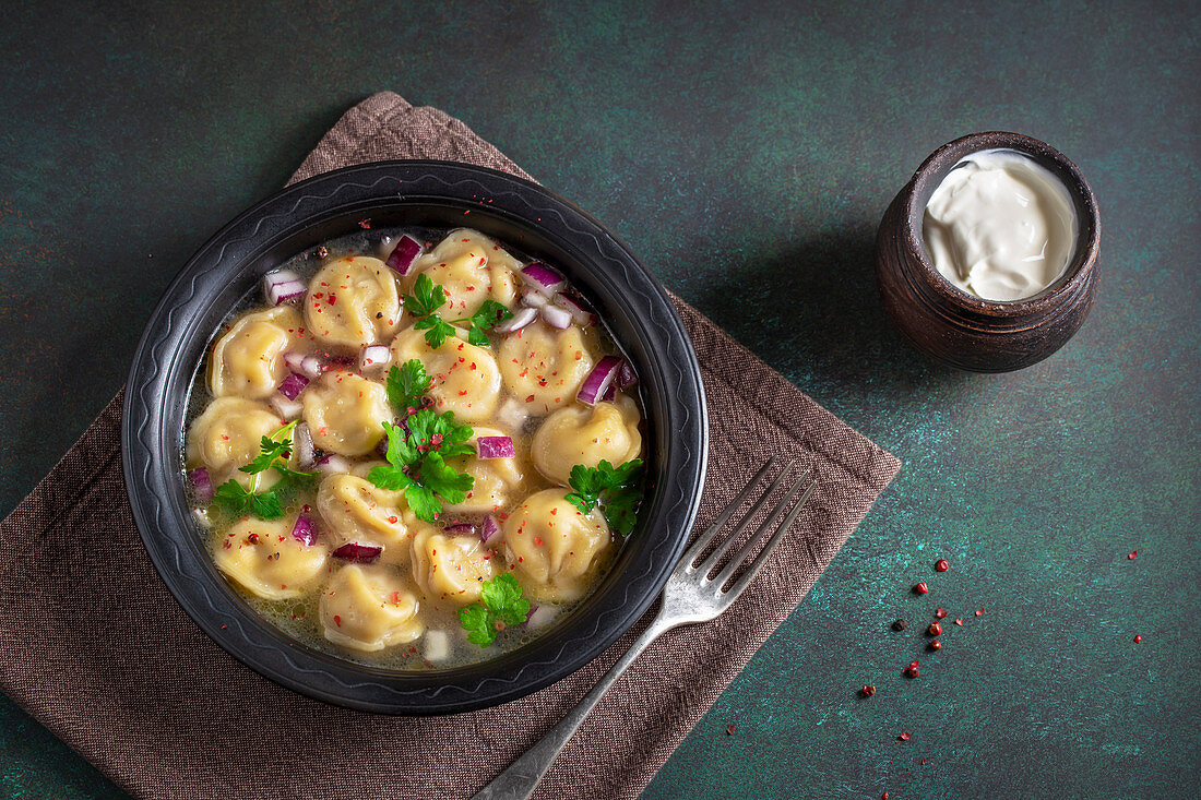 Pelmeni with sour cream