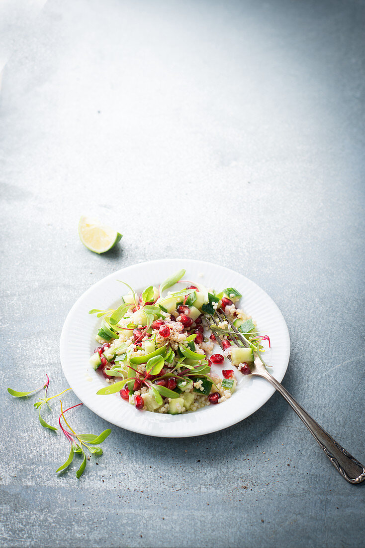 Millet salad with chard and pomegranate seeds