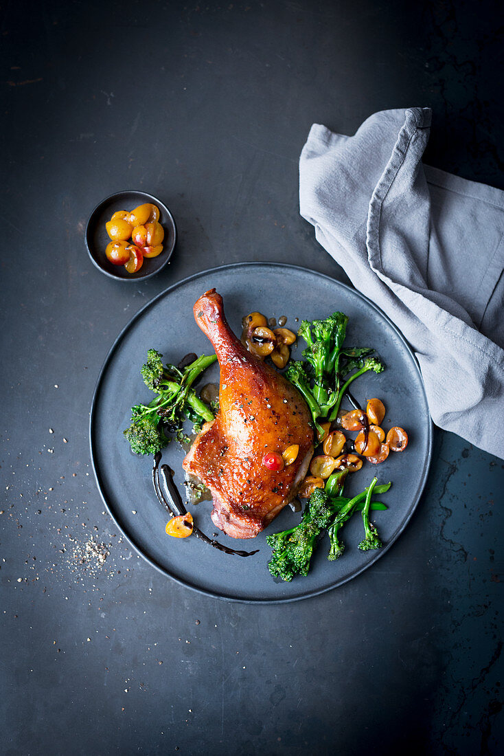 Roasted duck leg with wild broccoli and apricot compote