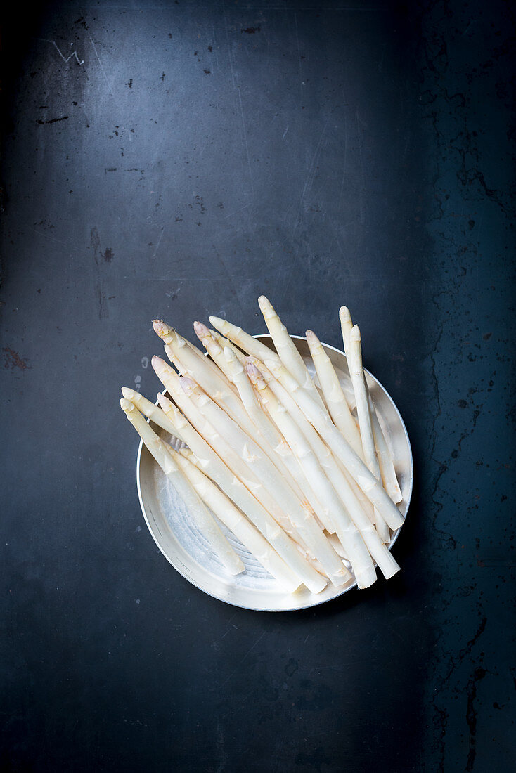 White asparagus on a silver plate