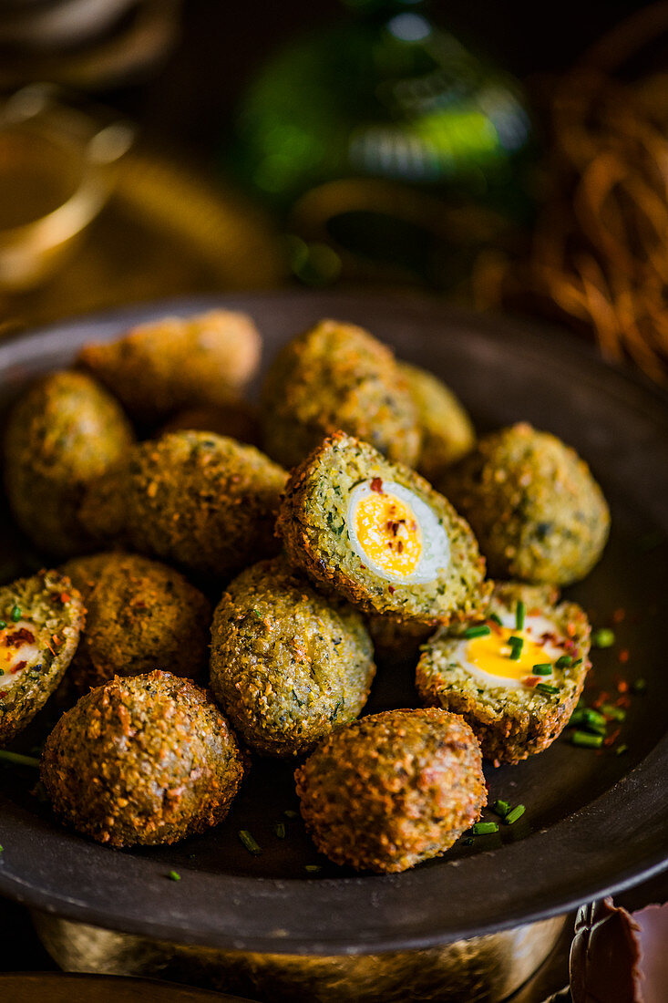Quail's eggs wrapped in falafel for an Easter high tea