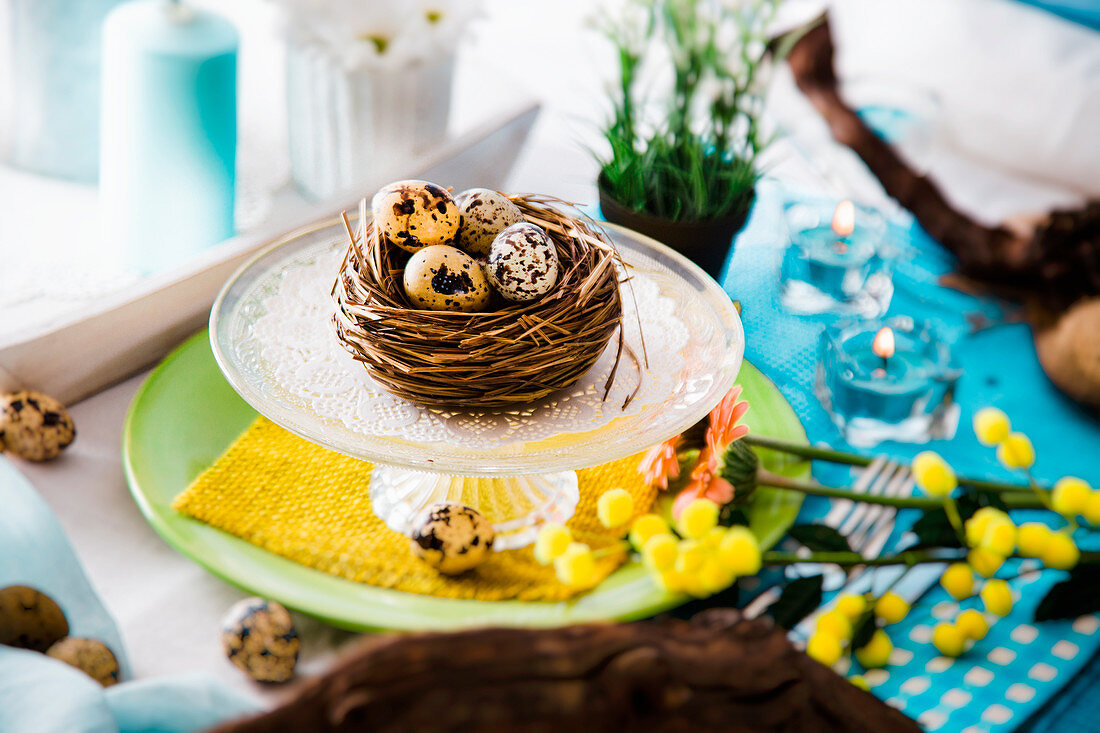 Easter table setting with quail eggs