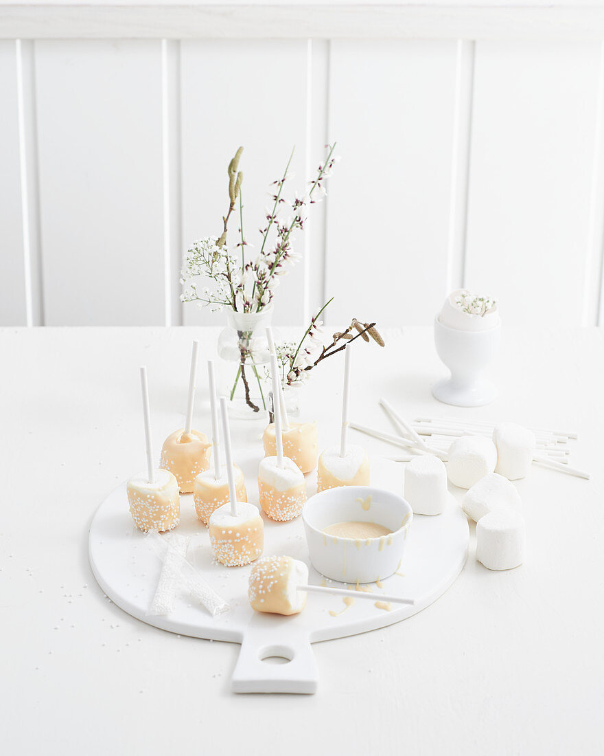 Marshmallow pops covered in white chocolate