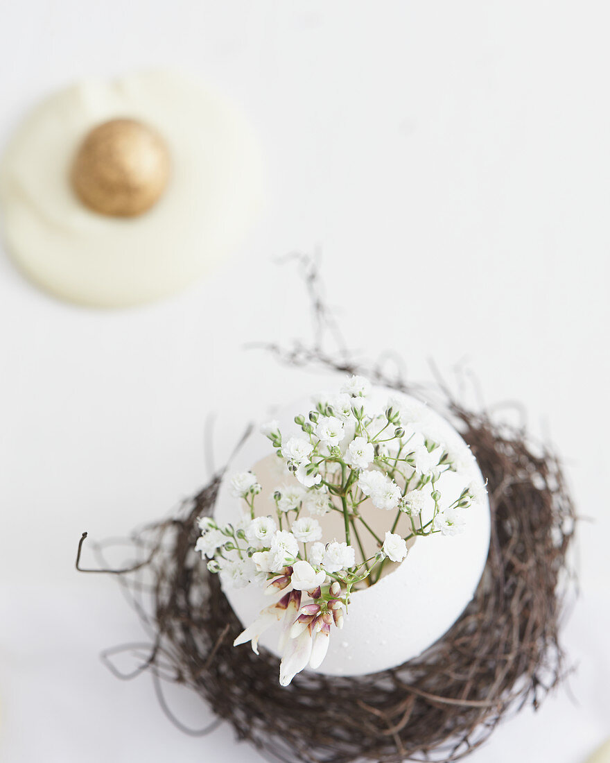 Delicate Easter arrangement with gypsophila in egg shell