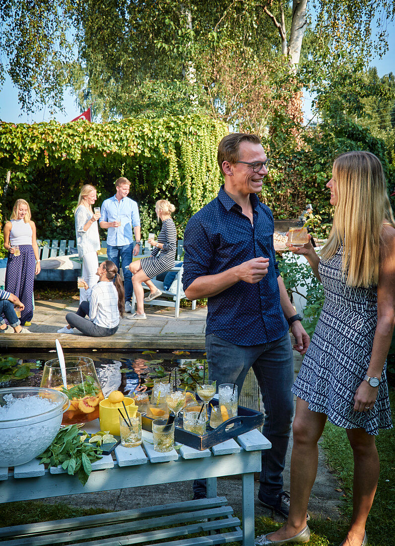 People at a garden party with drinks