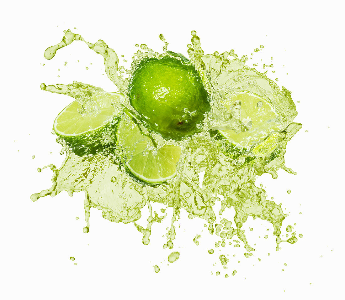 Limes with a juice splash