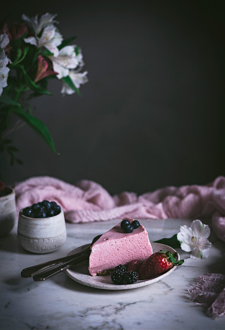 Strawberry mousse tart on table