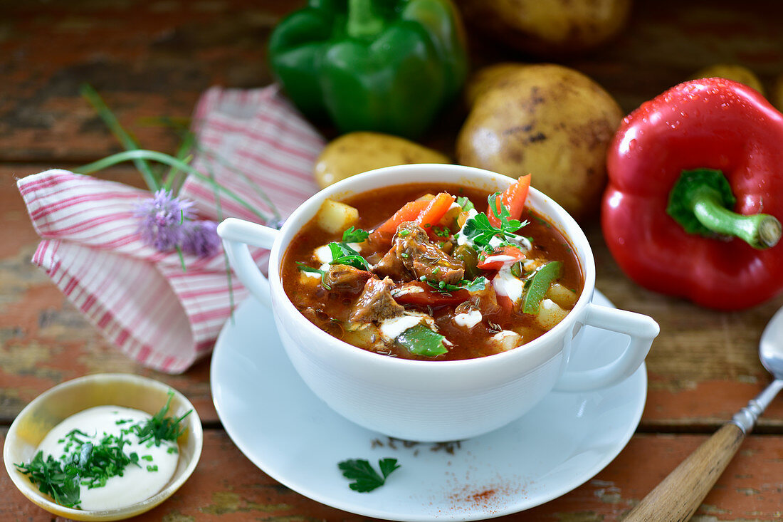 Goulash soup with peppers and potatoes