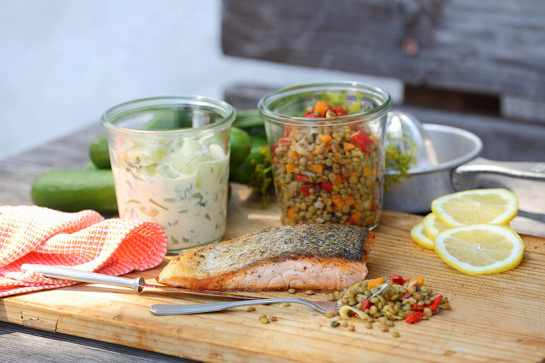 Salmon with cucumber and lentil salad