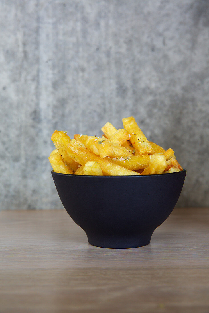 Spicy french fries in a bowl