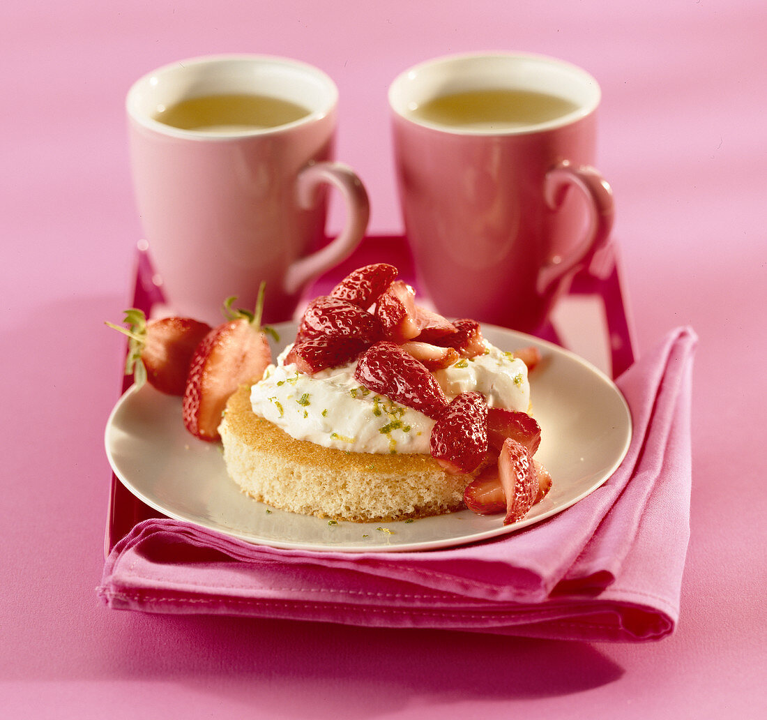 Strawberries on whipped cream sponge