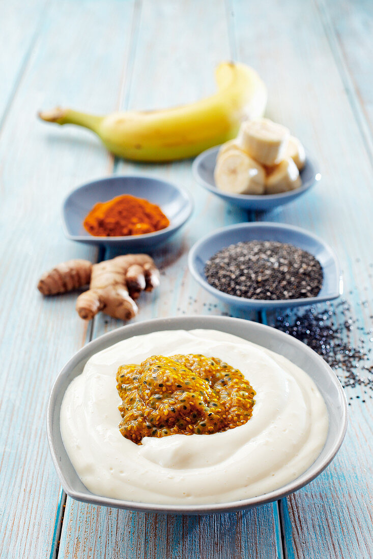 Banana bowl with chia seeds and turmeric in quark