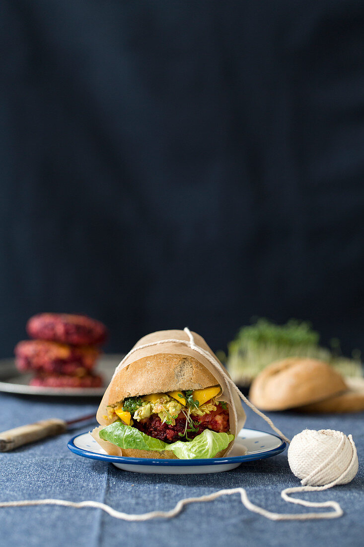 Burger with avocado, cress and beetroot