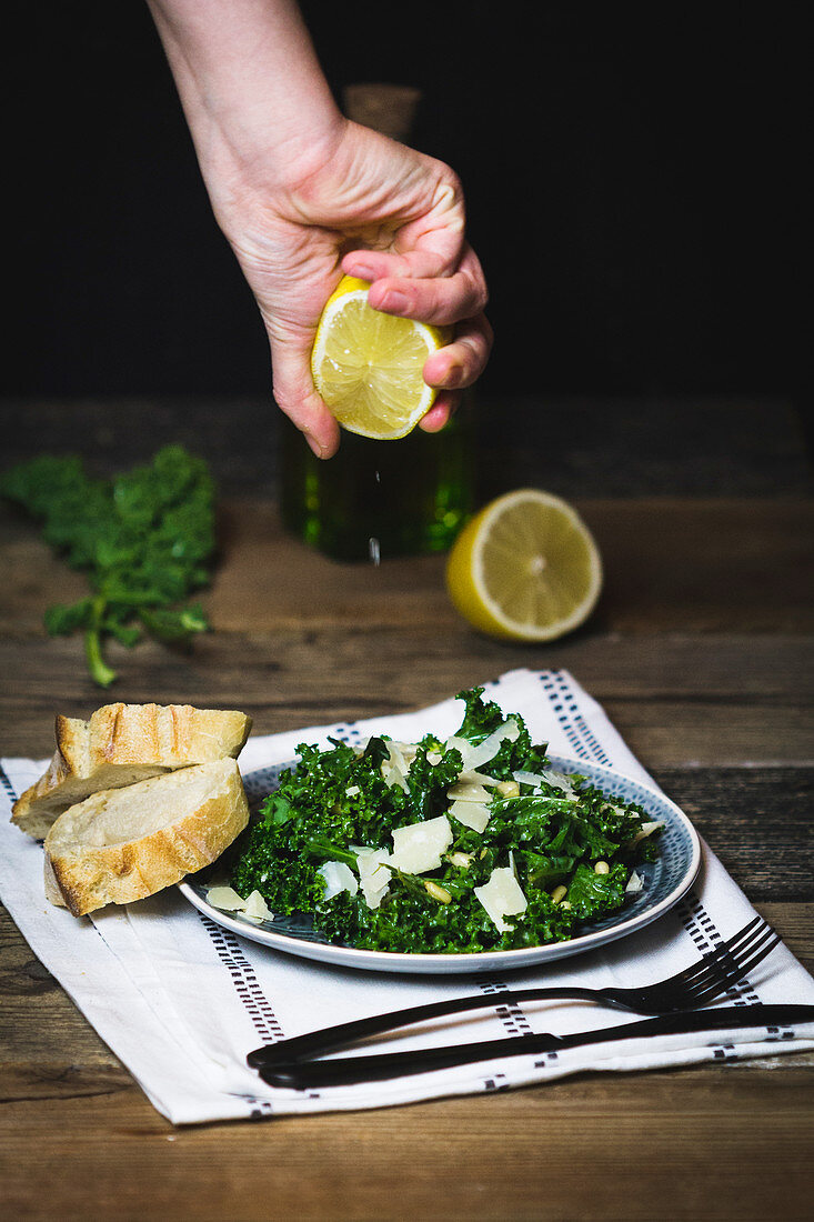 Kale salad with lemons, olive oil, pine nuts and Parmesan