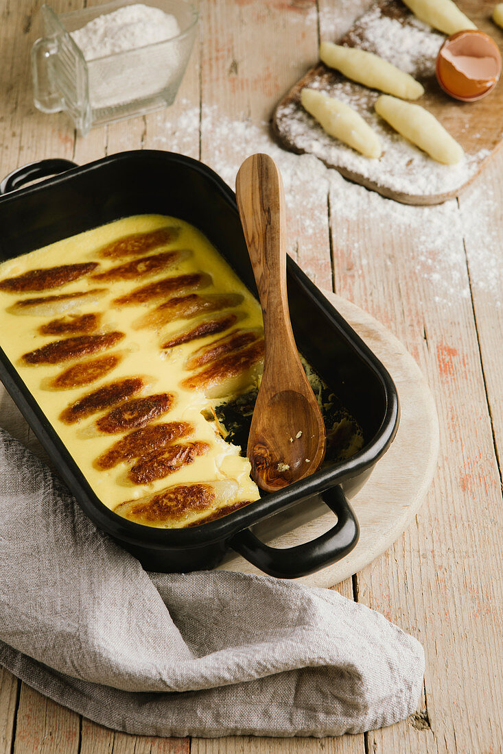 Potato orzo pasta bake in a baking dish