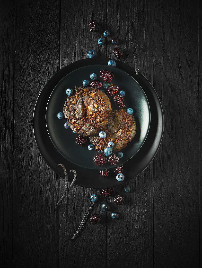 Chocolate cookies on a black plate