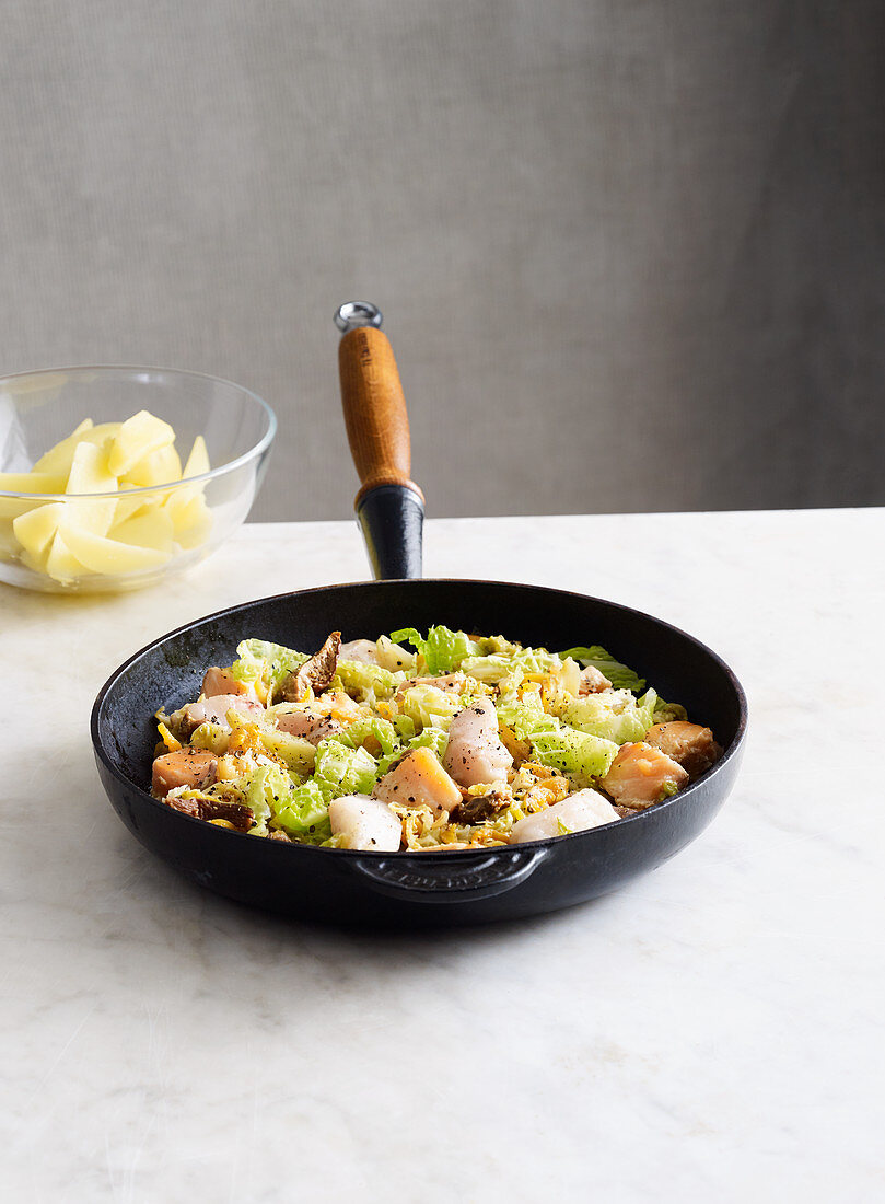 Fried fish with savoy cabbage