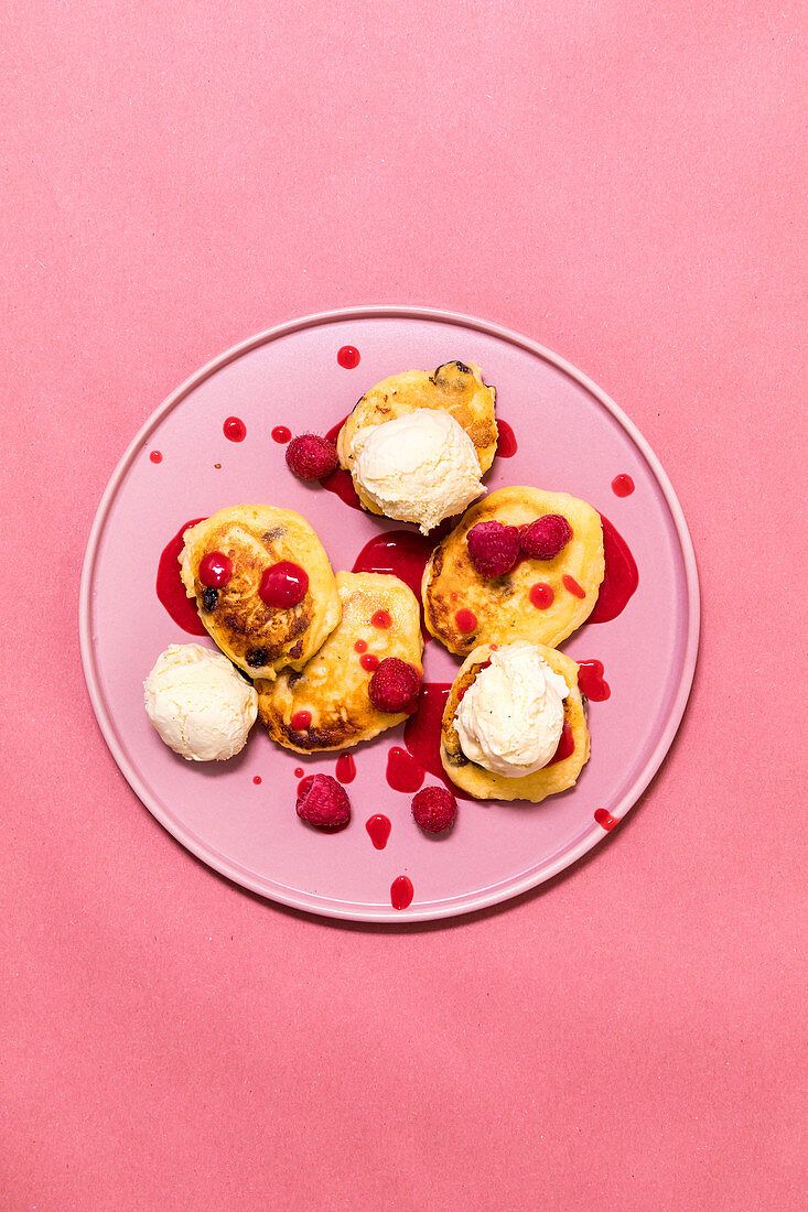 Quark pancakes with vanilla ice cream and raspberries