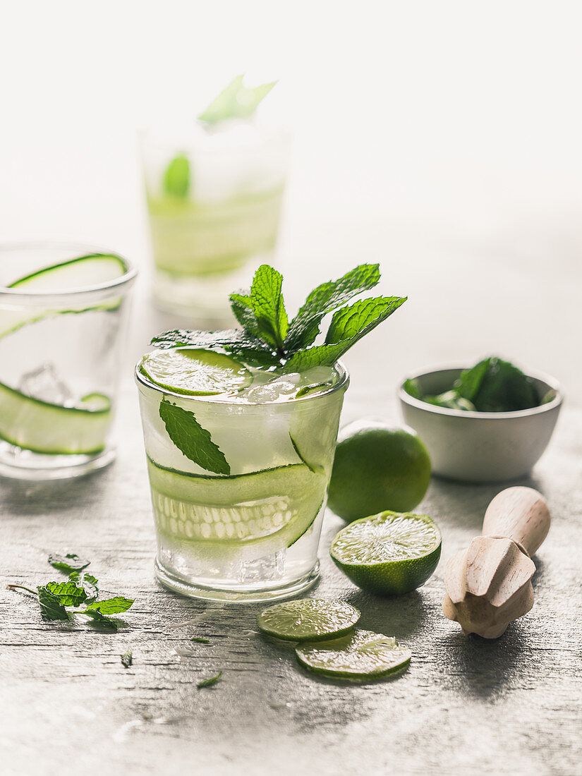 Cucumber lime and mint lemonade with ice cubes