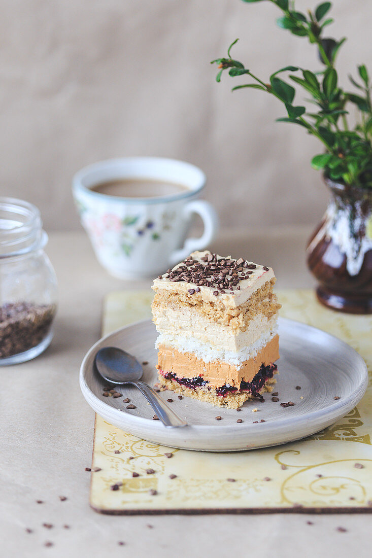 Layer cake with dulce de leche, coconut meringue and coffee frosting