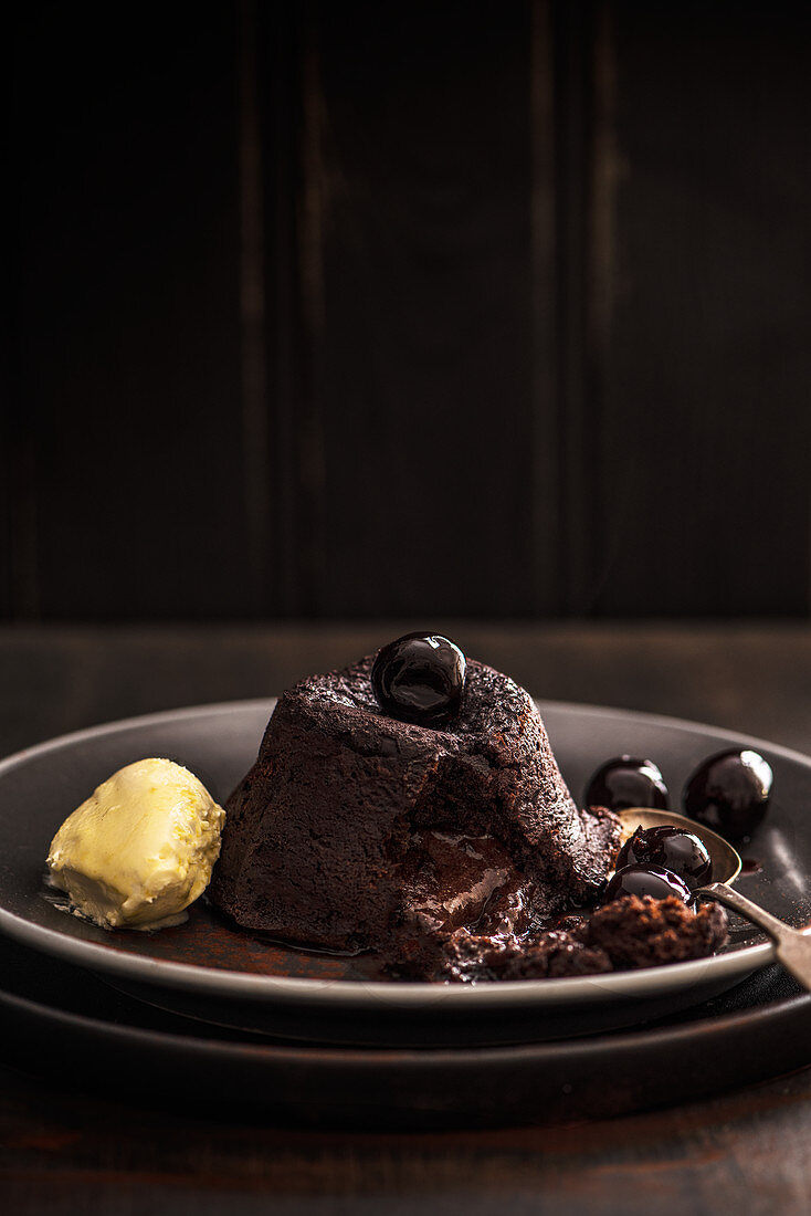 Hot chocolate fondant with amaretto cherries and clotted cream