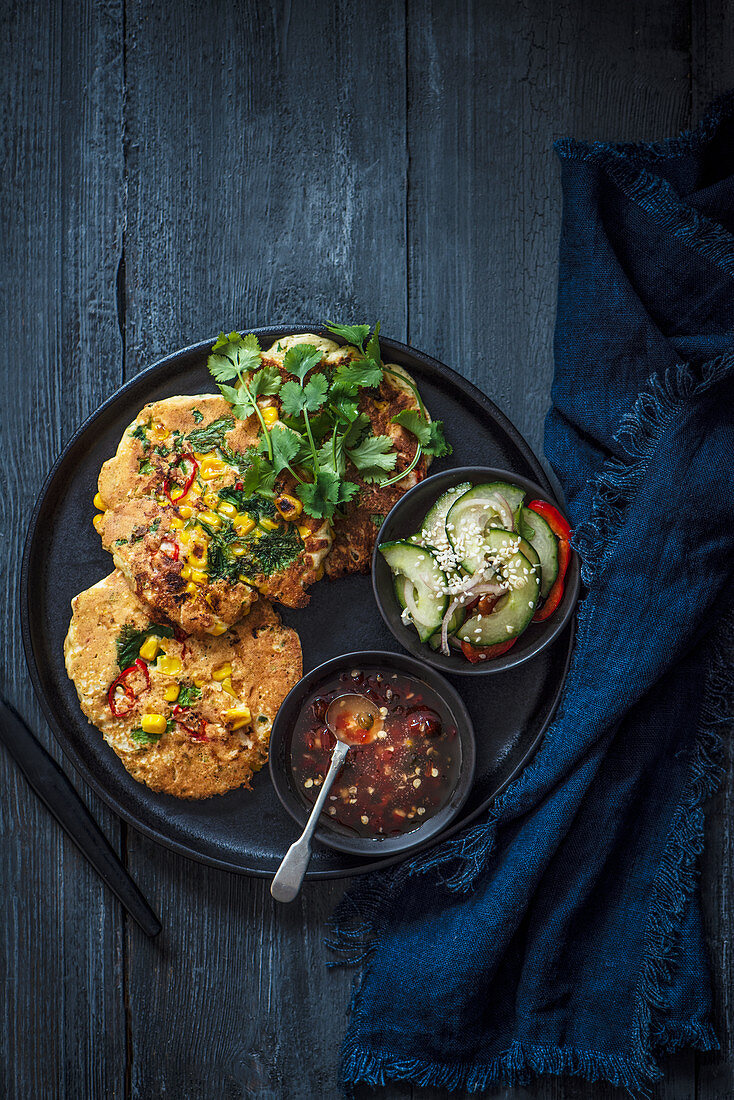 Sweetcorn and coriander pancakes with chilli jam and cucumber relish