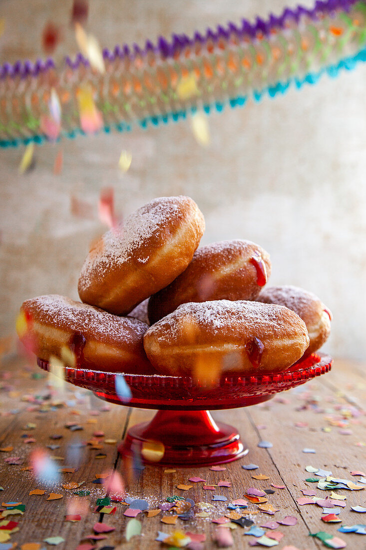 Doughnuts with rosehip jam decorated with confetti